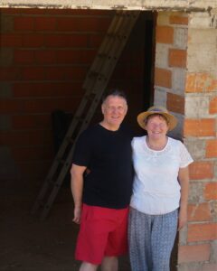 Tony and Tanya Outside Their property